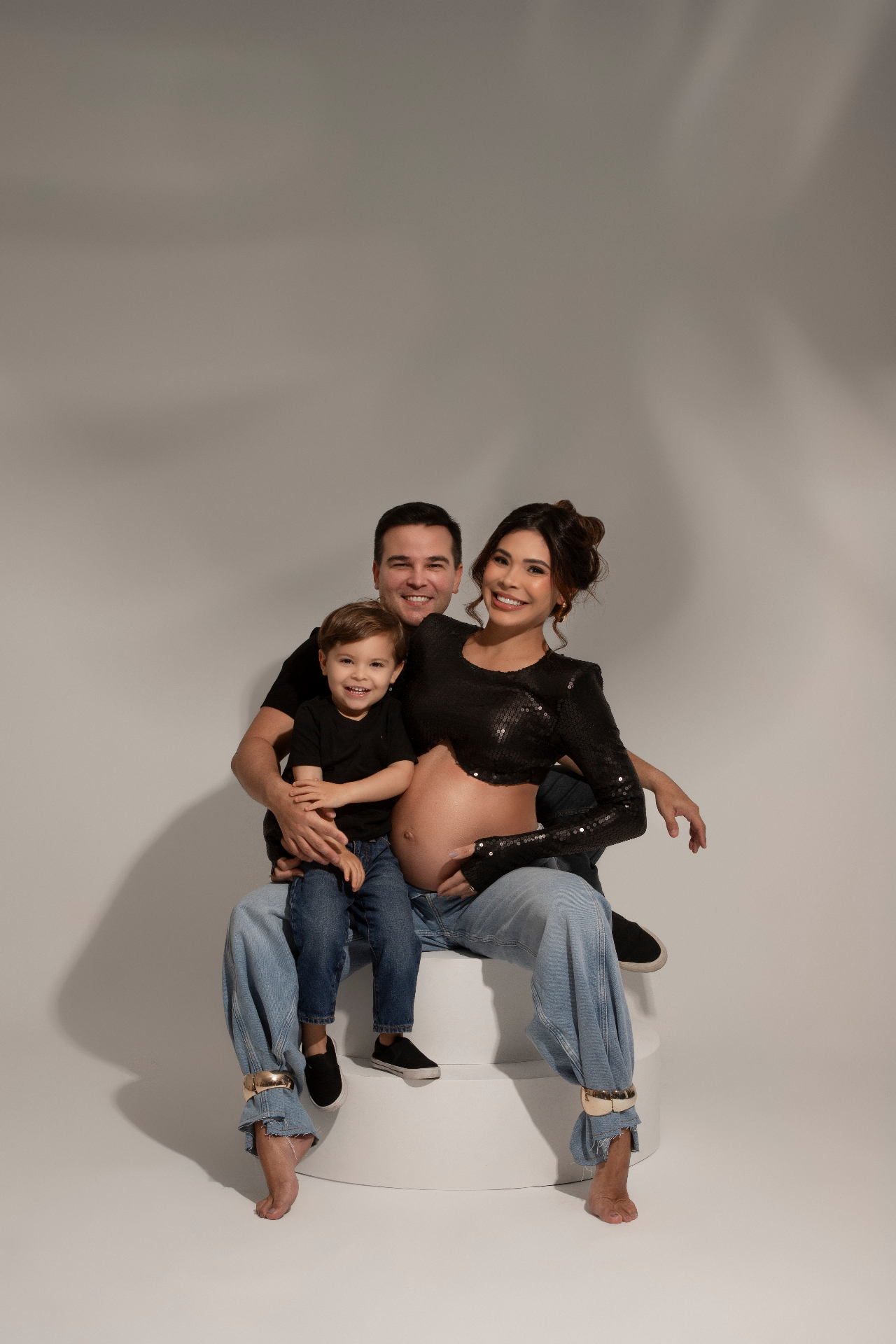 Família — gestante, marido e filho